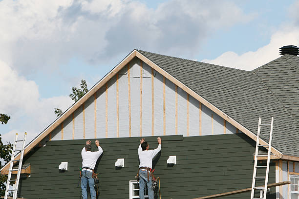 Professional Siding Contractor technician working in Foster, KY